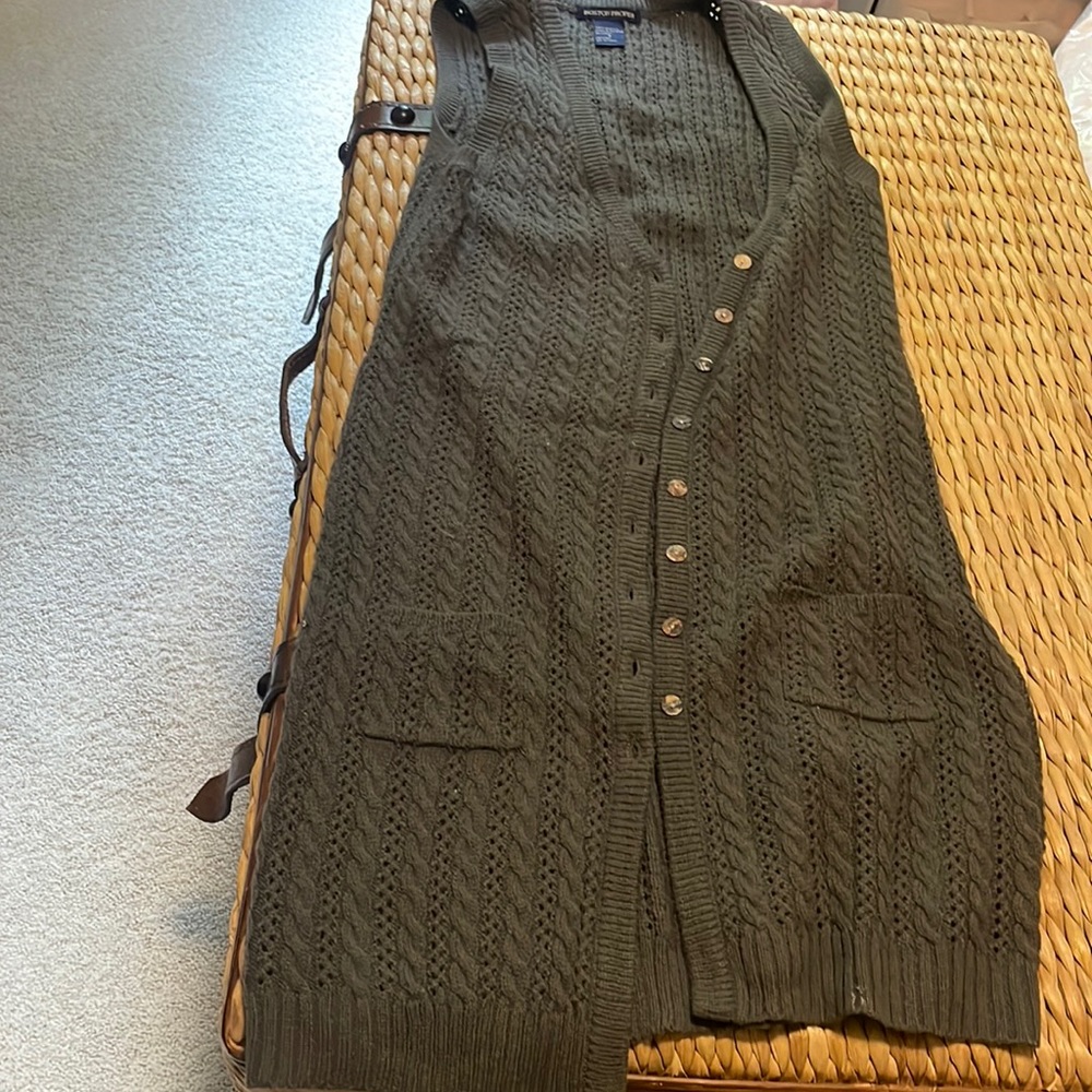 Long, cable knit vest